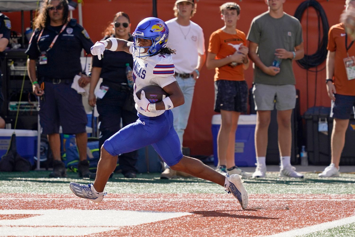 Sep 30, 2023; Austin, Texas, USA; Kansas Jayhawks wide receiver Trevor Wilson (7) runs in to the end zone for a touchdown after making catch in the second half against the Texas Longhorns at Darrell K Royal-Texas Memorial Stadium. Mandatory Credit: Scott Wachter-USA TODAY Sports  